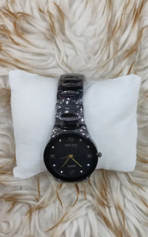 ساعة رادو "الأناقة السويسرية" الرجالية بتصميم معدني كلاسيكي