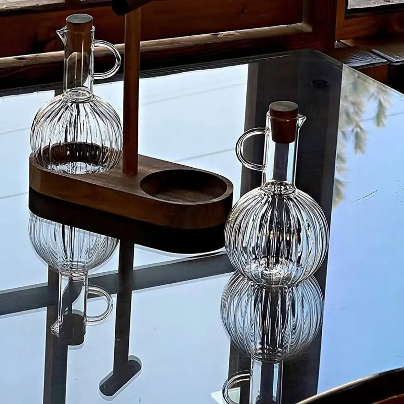 طقم زجاجات زيت وخل زجاجي مع حامل خشبي