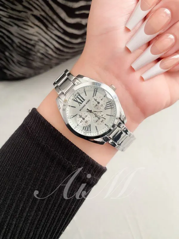 ساعة أنسيال بتصميم مايكل كورس النسائية