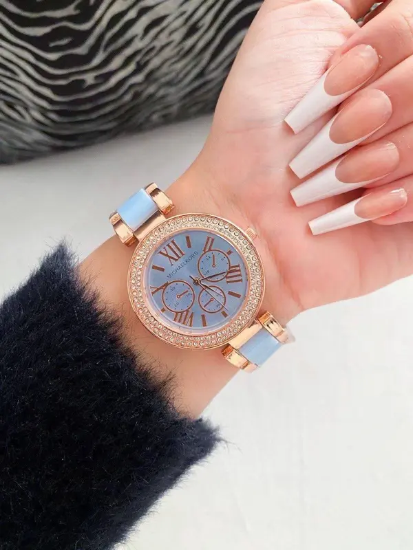 ساعة "إكسلانس" الحريمي المعدنية بتصميمها الأنيق