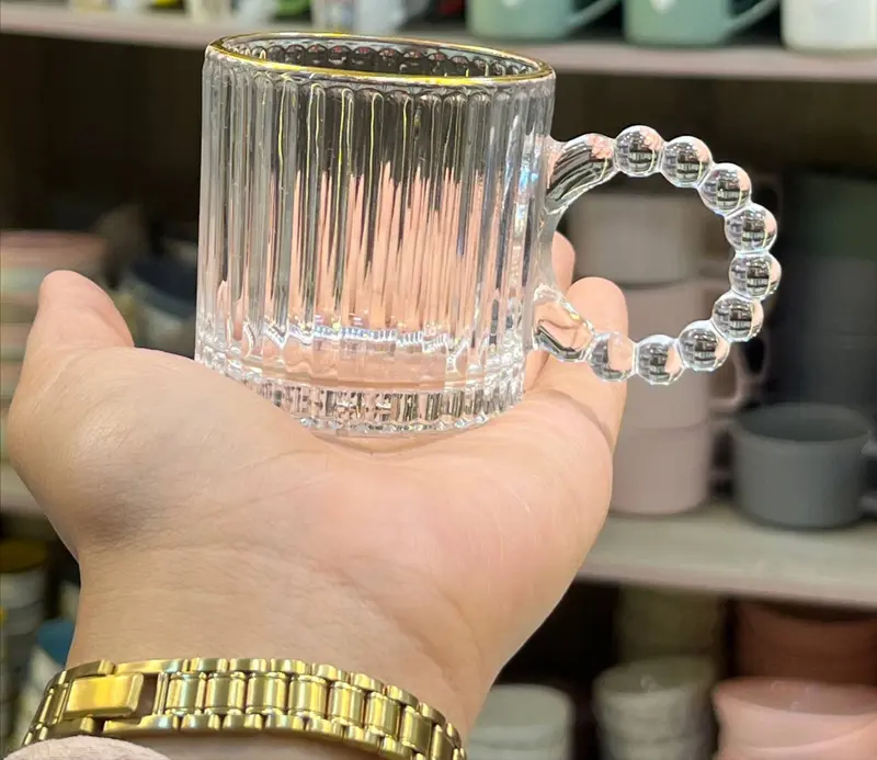 طقم قهوة سيراميك فاخر (تصميم مسطر وحرف ذهبي)