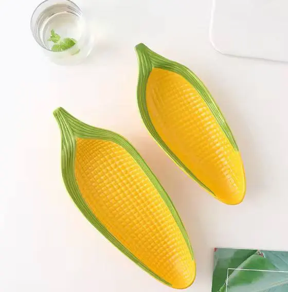 طبق تقديم على شكل ذرة