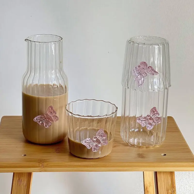 طقم قارورة وكوب زجاجي برسومات فراشة