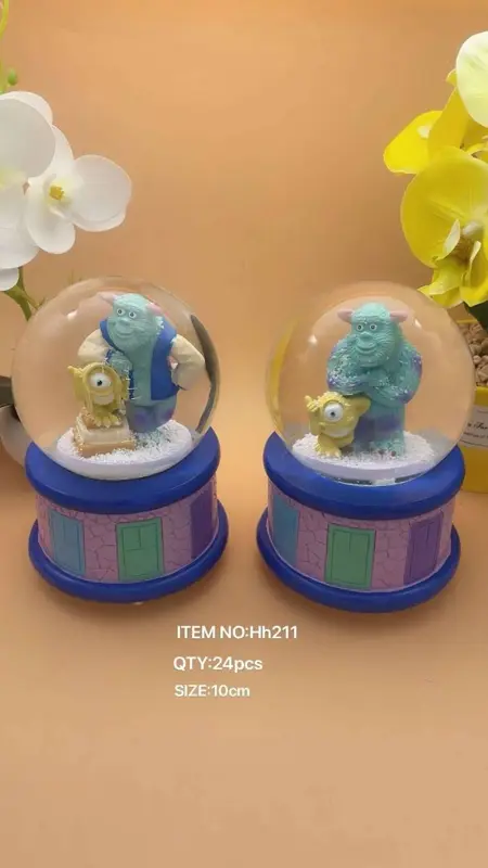 كرة ثلج وسط مضيئة موسيقية بتصاميم شخصيات متنوعة