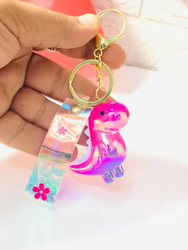 ميدالية الديناصور الساحرة، تصميم فريد بألوان جذابة